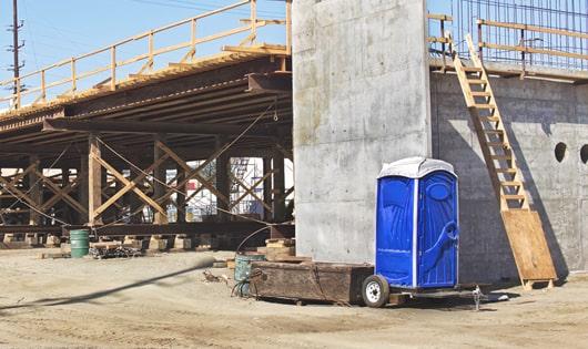 easily accessible porta potties at a job site, saving workers from long walks to a permanent restroom